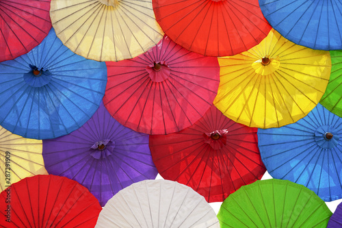 Colorful paper umbrella isolated on white background. This has clipping path.  
