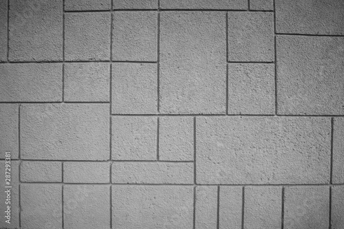 Pattern, pattern of white concrete blocks. Wall or sidewalk. rough texture.