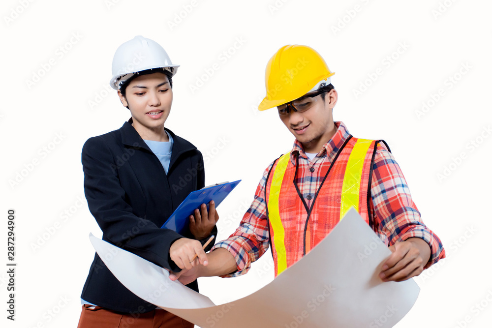 Woman asian engineers wear white safety hats talk and take notes on documents with the contractors wearing yellow safety hats that hold the blueprint Construction project. Isolated white background. Woman asian engineers wear white safety hats talk and take notes on documents with the contractors wearing yellow safety hats that hold the blueprint Construction project. Isolated white background.