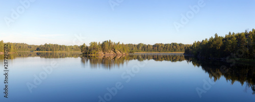 morning panorama on a forest lake © Maslov Dmitry