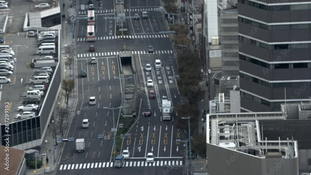 Aerial view of city with moving vehicles Aerial view of city with moving vehicles