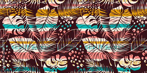 Abstract seamless pattern with tropical leaves. Hand draw texture. © Nadia Grapes