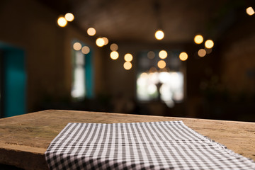 red tablecloth on wooden background empty deck