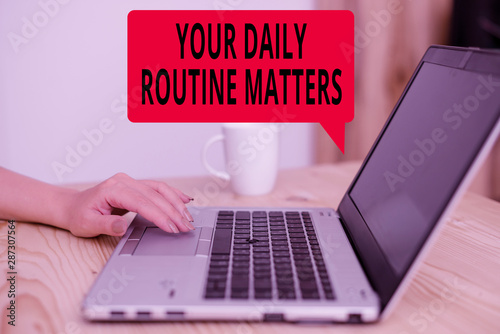 Text sign showing Your Daily Routine Matters. Business photo showcasing practice of regularly doing things in fixed order woman laptop computer smartphone mug office supplies technological devices