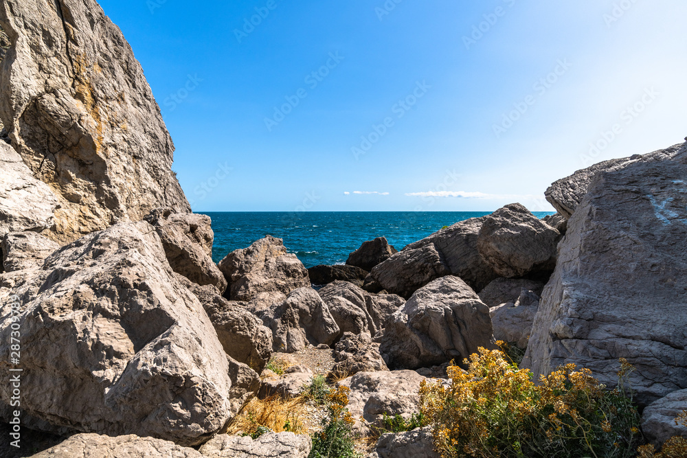 Beautiful seascape with stones on the shore in Crimea