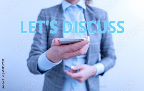 Word writing text Let S Discuss. Business photo showcasing asking someone to talk about something with demonstrating or showing Business concept with mobile phone and business woman