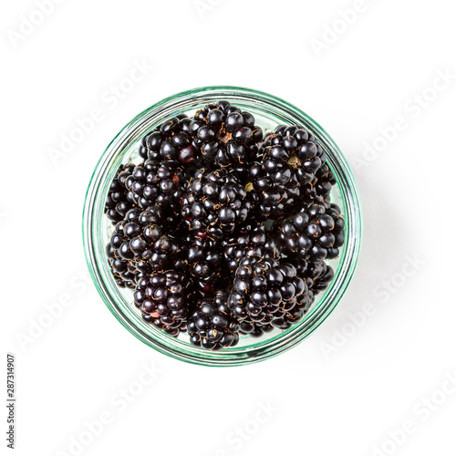 Blackberry fruits in glass bowl.