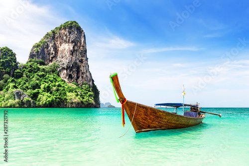 Thai traditional wooden longtail boat. © preto_perola