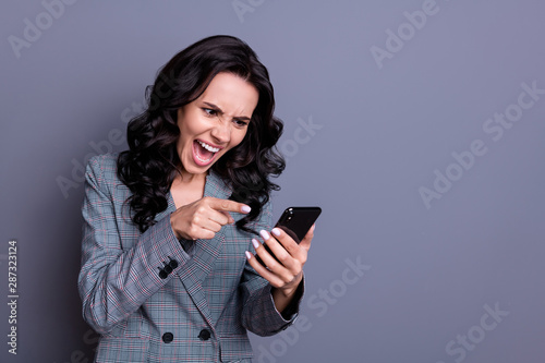 Foto You fired Portrait of depressed wavy curly haired marketer showing her index fin