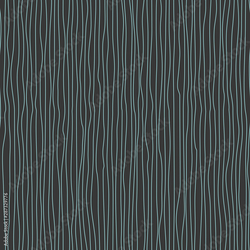 Wavy line pattern. White vertical wavy lines on gray background. Strips similar to threads. Hand drawn stripes. 