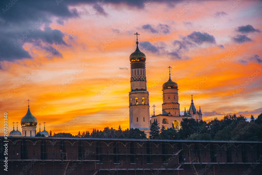 Naklejka premium Ivan Great Bell Tower of the Moscow Kremlin on sunset, Russian Federation