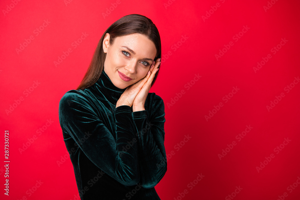 Portrait of sweet cute millennial hands palms face isolated over red background Portrait of sweet cute millennial hands palms face isolated over red background