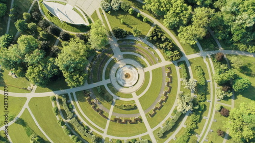 Aerial View of Pole Mokotowskie Park in Warsaw City in Poland, with round structure of sidewalks