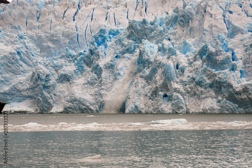 spegazzini glacier sur argentina. the ice is melting, falling in the lake. photo
