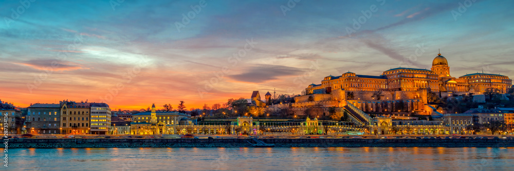 Panorama of Buda castle and the Danube river in Budapest at sunset, Hungary