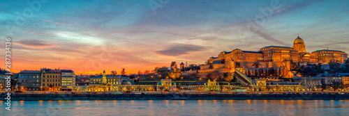 Panorama of Buda castle and the Danube river in Budapest at sunset, Hungary