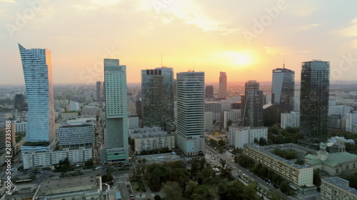 Aerial Panoramic View of Warsaw City Centre at Sunset, Poland, Europe. Urban Skyline with Skyscrappers and Car Roads