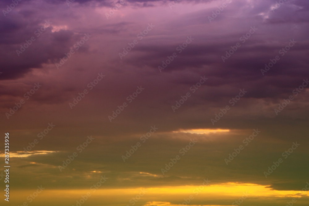 amazing unreal bright fantasy sunset or sunrise clouds in the sky for using in design as background.