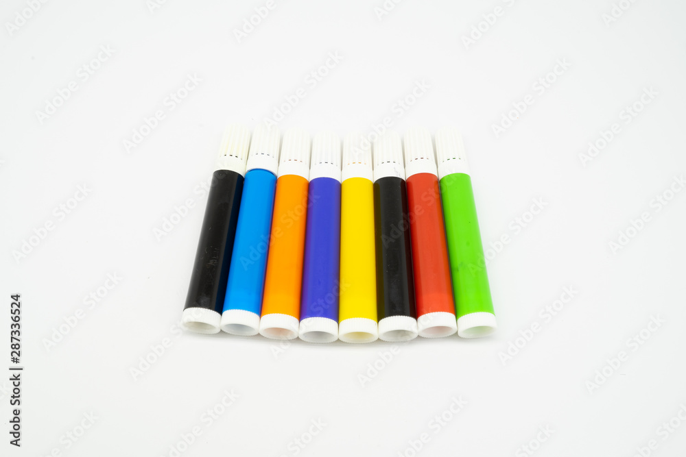 School supplies, marker pen stationery on white background - space for caption School supplies, marker pen stationery on white background - space for caption