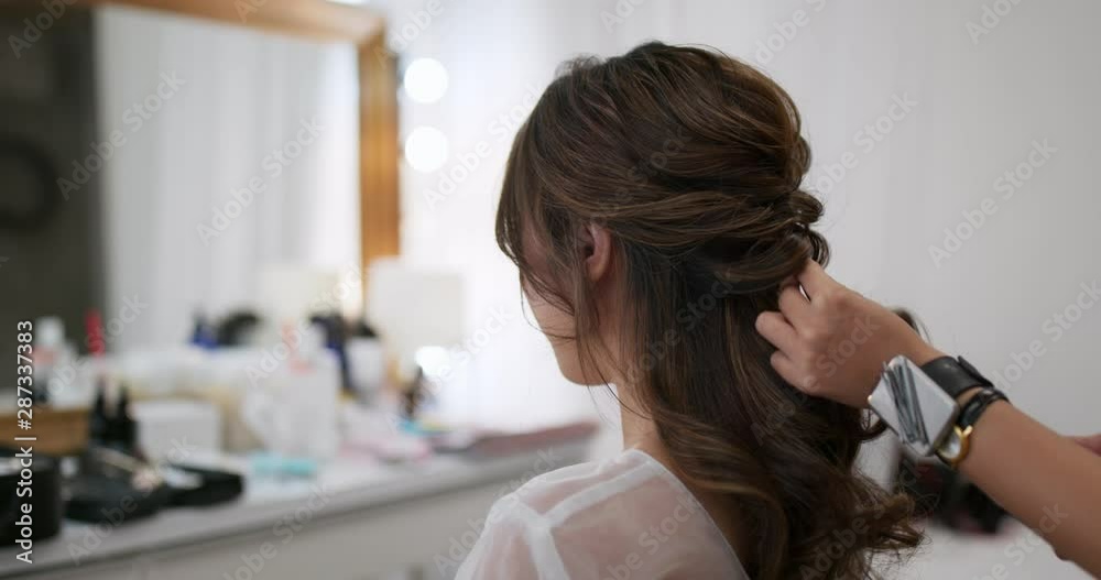 Stylist makes hair for bride Stylist makes hair for bride