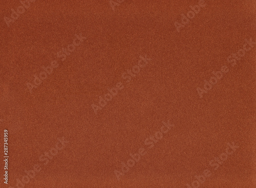 Amber Colored Piece of Metallic Paper Background