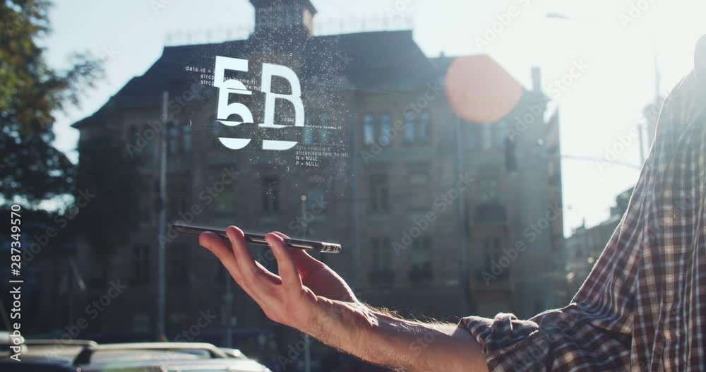 Digital animation of future technology lines flowing from modern smartphone connecting into 5G sign. Male hand interact with a HUD screen hologram activating global network mobile comminication system
