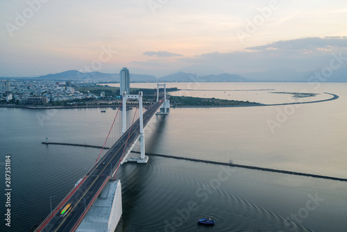 Tran Thi Ly bridge crossing Han river at twilight in Da Nang, central Vietnam
