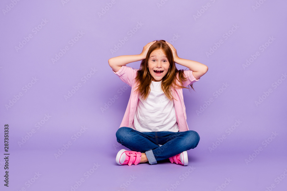 Full size photo of foxy little lady sitting floor listen cool news wear casual clothes isolated purple background Full size photo of foxy little lady sitting floor listen cool news wear casual clothes isolated purple background