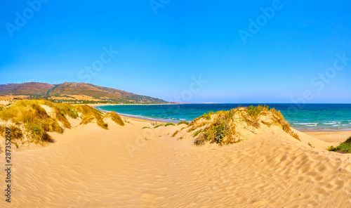 Punta Paloma beach, a unspoiled white sand beach of The Nature Park del Estrecho. View from the Dune of Valdevaqueros. Valdevaqueros inlet. Tarifa, Cadiz. Andalusia, Spain.
