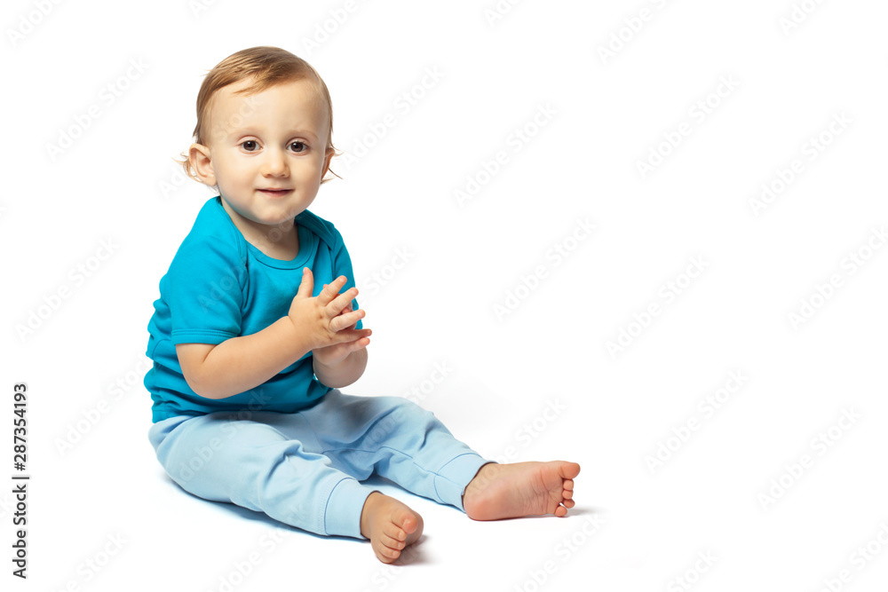 Cute baby boy playing isolated on the white background. Copy place Cute baby boy playing isolated on the white background. Copy place