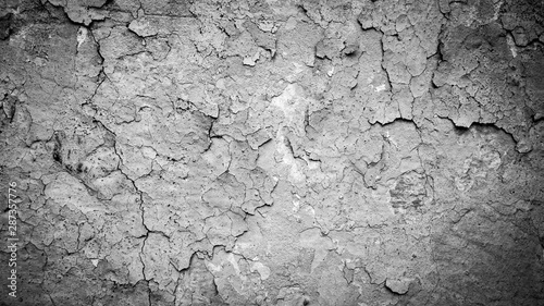 Cracked wall with old layers of paint. Free space for text, copy space