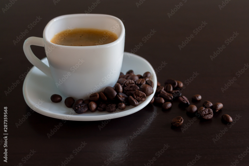 cup of coffee and beans on wooden background cup of coffee and beans on wooden background