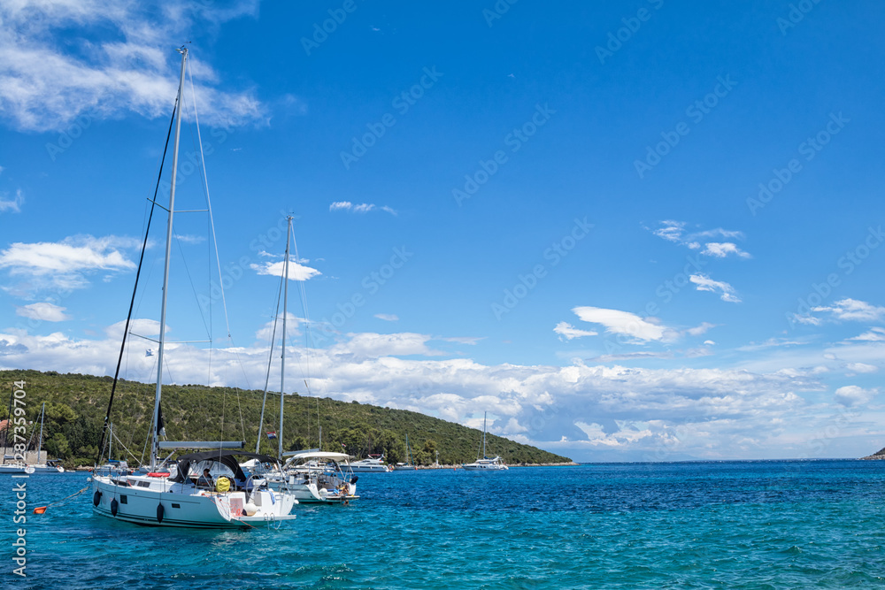 luxury big white sailing yachts at the sea