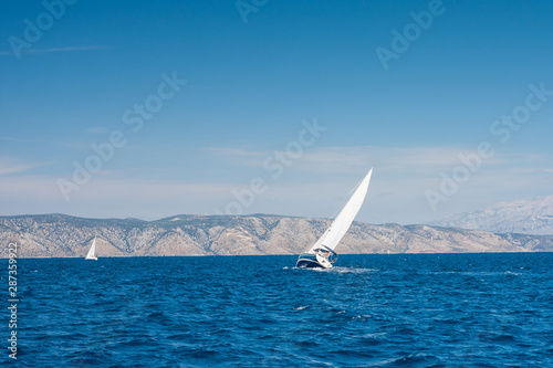 luxury big white sailing yachts at the sea