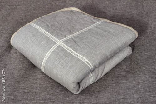  linen blanket on the bed
