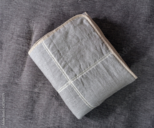 linen blanket on the bed