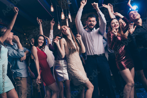 Party hard stay all nigh concept. Buddies dancing having fun active dynamic discotheque raise hands feel content dress shirt trousers suit formal wear indoors