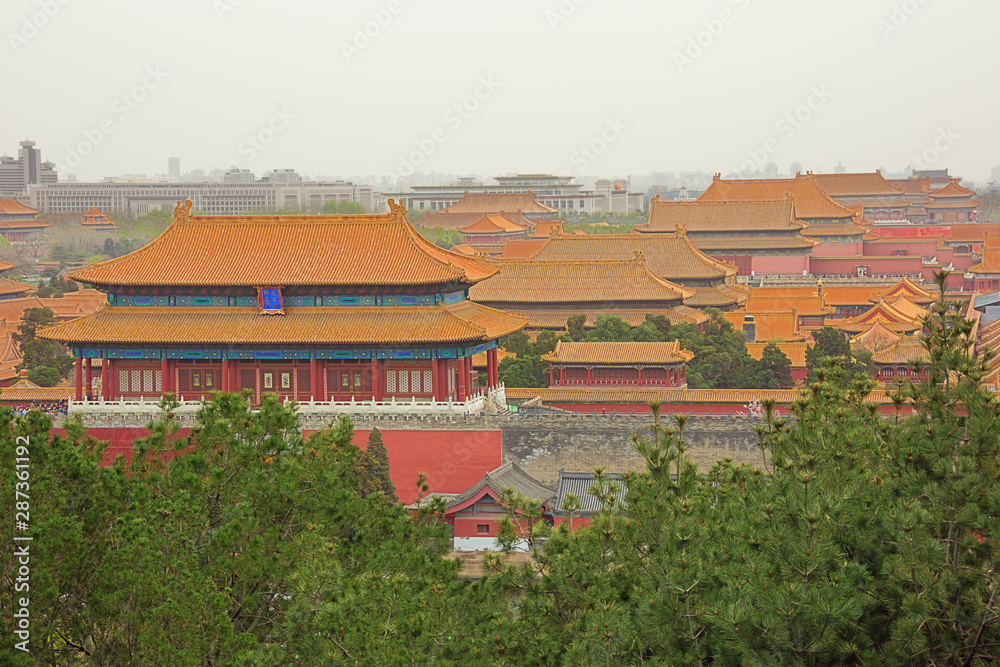 Looking over the roofs of the palaces in the Forbidden City, seen from the Jingshan Park in Beijing