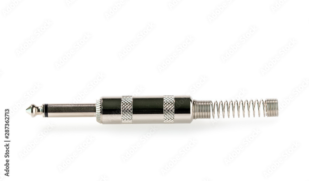 Silver audio plug for microphone connector to music isolated on white background. Silver audio plug for microphone connector to music isolated on white background.