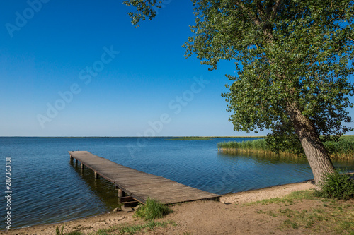 Fototapeta Naklejka Na Ścianę i Meble -  Footbridge on the Szczecinski Lagoon in Wolin, Poland