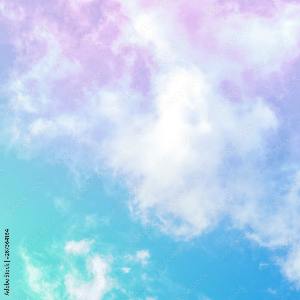 Teal blue and purple sky with white clouds, an abstract background with a place for text, toned image