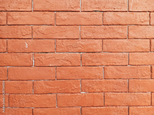 Orange brick wall. Construction material texture.