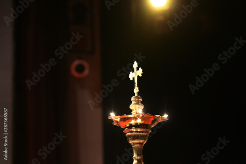 Lightning lamp with cross 