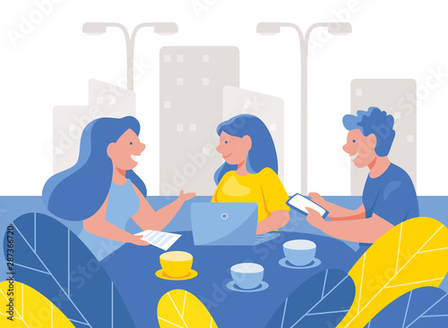 Business people drinking coffee and working in an outdoor cafe. Group of businessmen talking, hold meeting in cafe