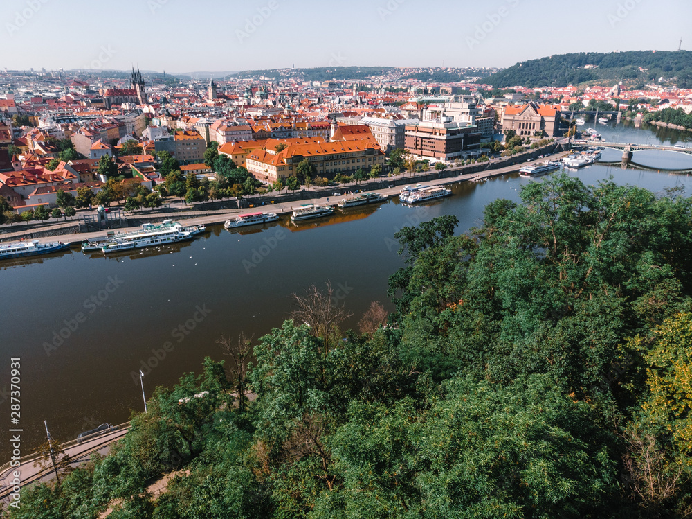 Fototapeta premium Scenic summer sunrise aerial view of the Old Town pier architecture and Charles Bridge over Vltava river in Prague, Czech Republic, travel tour to Europe concept design.