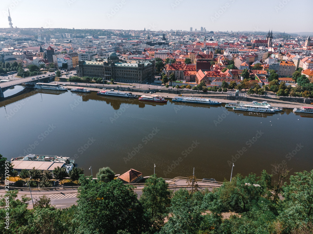 Fototapeta premium Scenic summer sunrise aerial view of the Old Town pier architecture and Charles Bridge over Vltava river in Prague, Czech Republic, travel tour to Europe concept design.