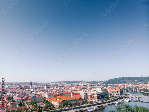 Scenic summer sunrise aerial view of the Old Town pier architecture and Charles Bridge over Vltava river in Prague, Czech Republic, travel tour to Europe concept design. copy space