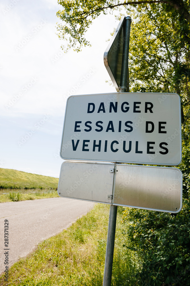 Danger, Essais de vehicules translated freom French as Danger, new vehicles testing near the dedicated for tests highway in France