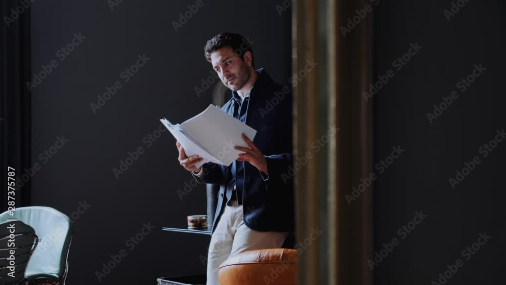 Businessman reading documents in the office