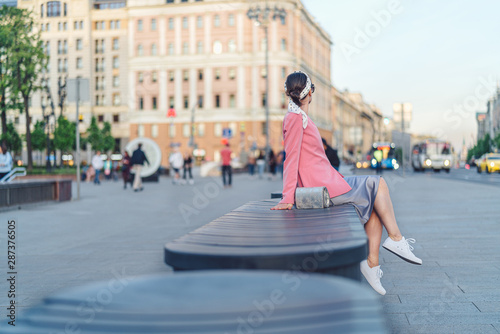 Attractive girl on a bench in Moscow © AboutLife